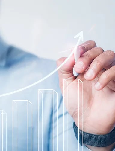 Professional working on scriptwriting and storyboarding on a laptop.